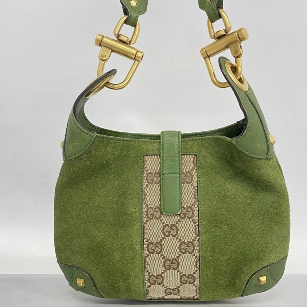 Vintage 1990’s suede handbag. Verified by Gucci Store Excellent condition.